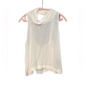 Free People. Ivory flowy tank top. Size S